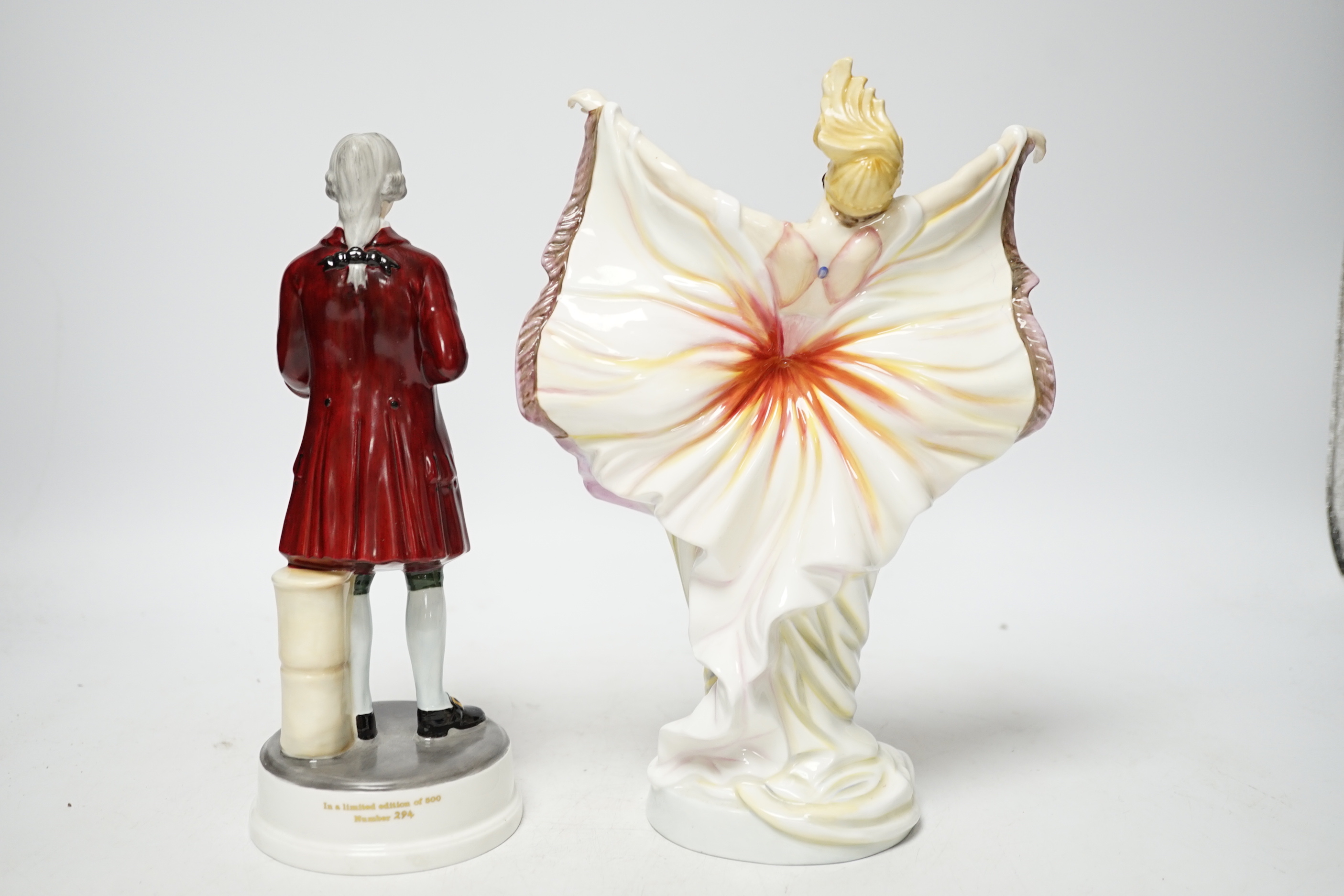 A Royal Doulton ‘Prestige Butterfly Ladies’ figure ‘The Peacock’ HN 4846 together with a Wedgwood figure of Josiah Wedgwood FRS, tallest 25cm